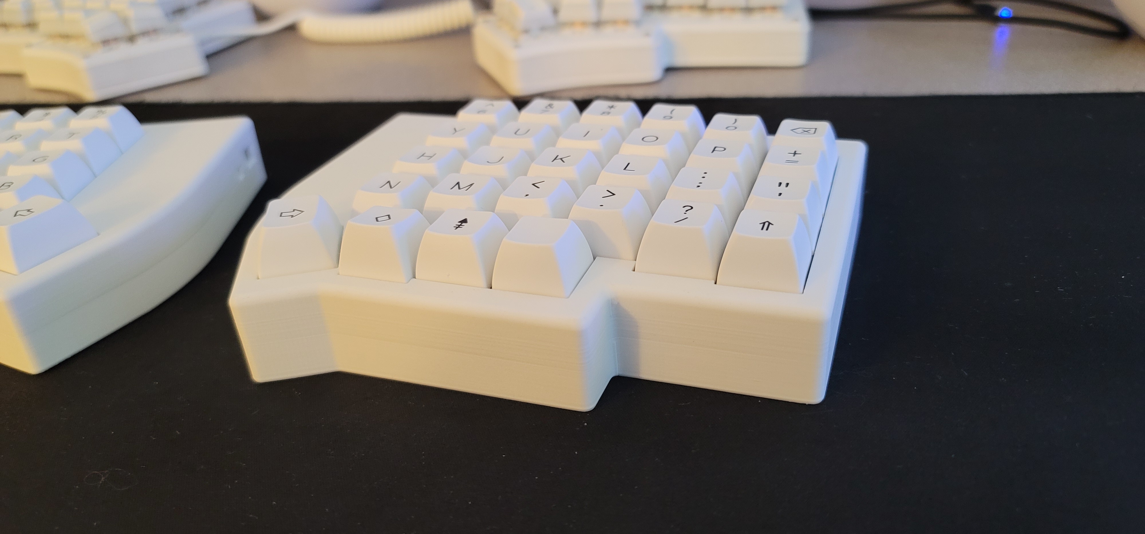 Image of a white split ortholinear keyboard